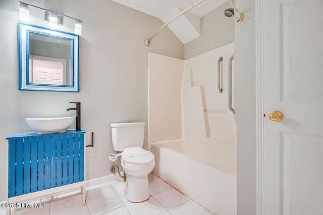 full bathroom featuring tile patterned floors, shower / washtub combination, sink, and toilet