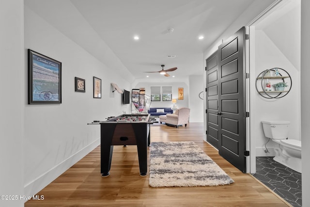 rec room featuring hardwood / wood-style flooring and ceiling fan