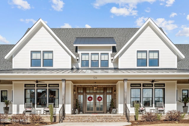 view of front of house featuring french doors and covered porch