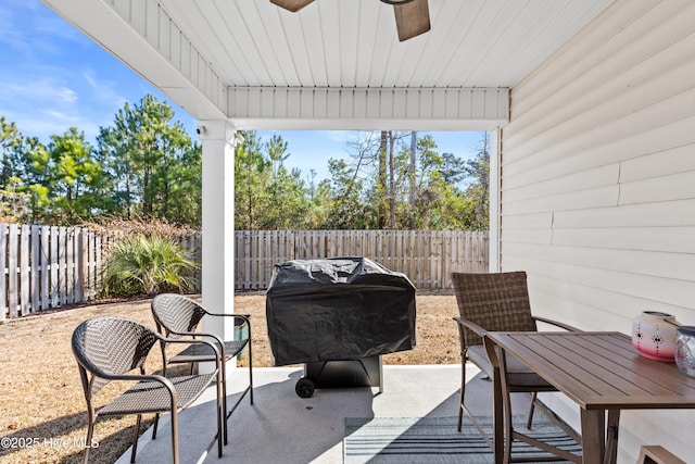 view of patio / terrace featuring grilling area and ceiling fan