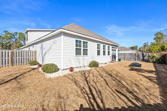 view of home's exterior featuring a lawn