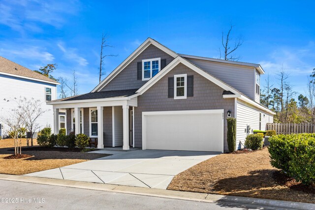 back of property featuring ceiling fan, a patio area, and a lawn