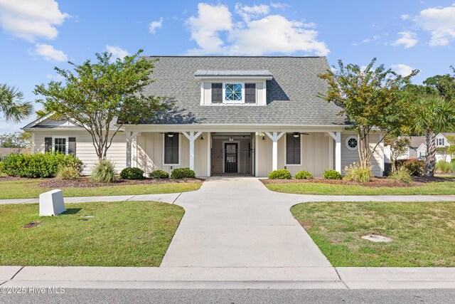 view of front of home with a front lawn