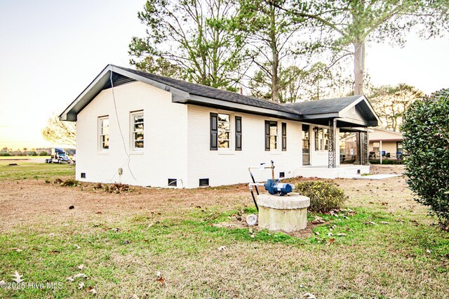 exterior space with a front yard