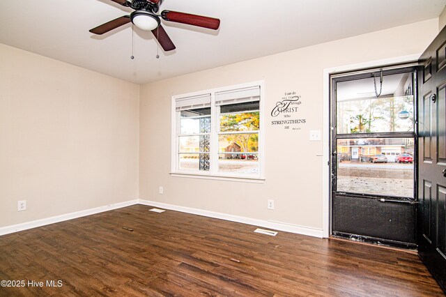 entrance foyer with dark hardwood / wood-style flooring and ceiling fan