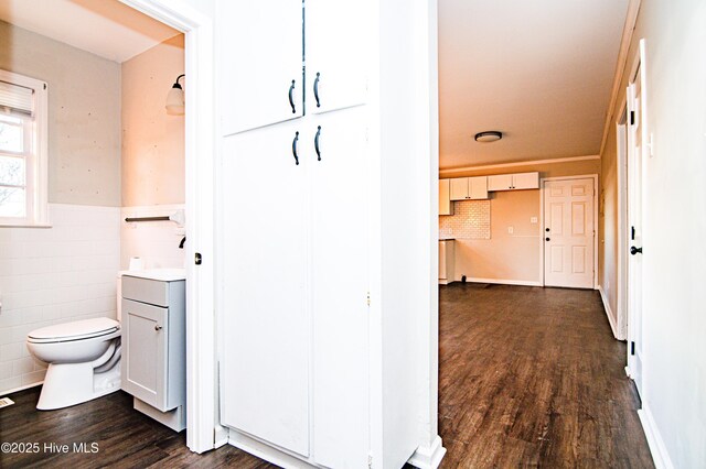 hallway featuring dark wood-type flooring