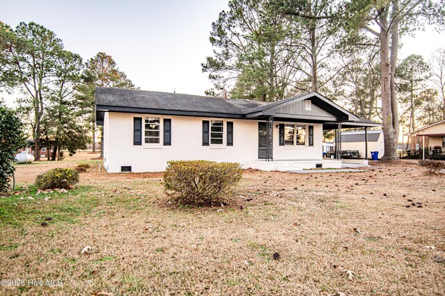 view of front of home with a front yard