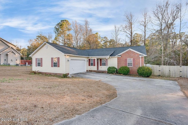 single story home with a garage