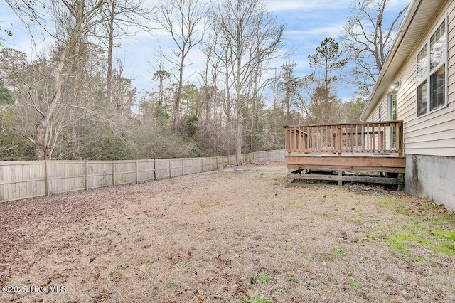 view of yard with a deck