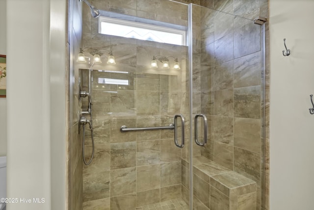 bathroom featuring walk in shower