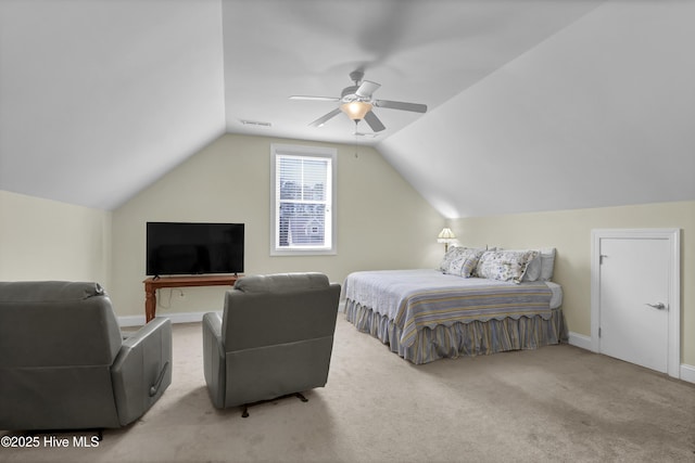 carpeted bedroom featuring vaulted ceiling and ceiling fan