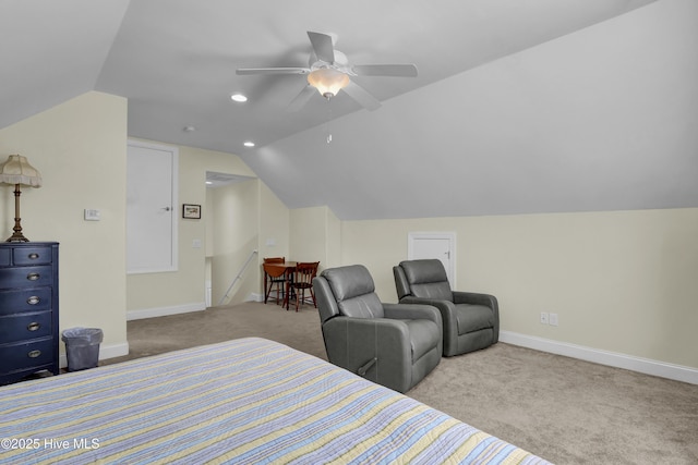 bedroom with lofted ceiling, light carpet, and ceiling fan