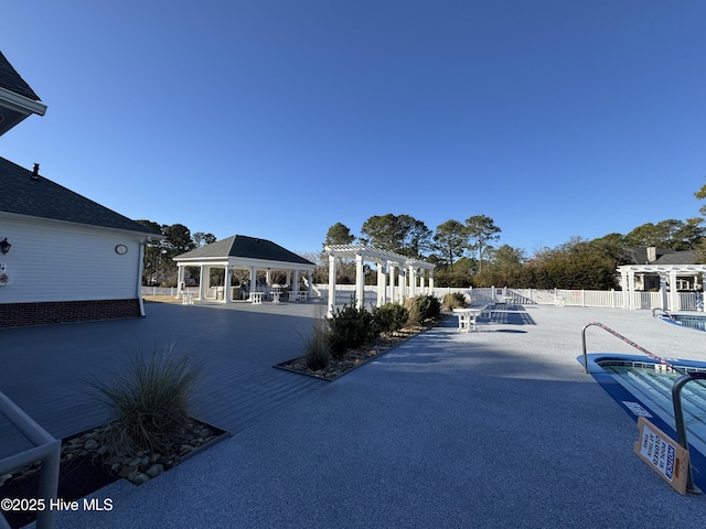 view of swimming pool featuring a gazebo, a patio, and a pergola