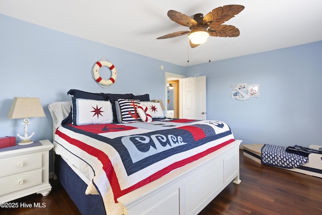 bedroom featuring dark wood-style floors and a ceiling fan