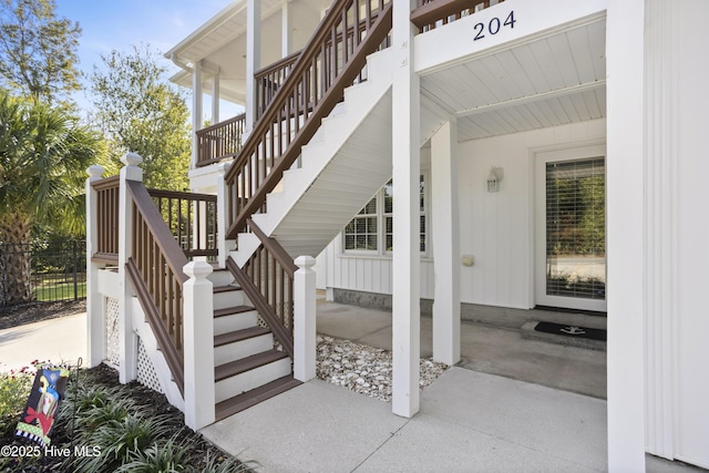 property entrance with a patio area