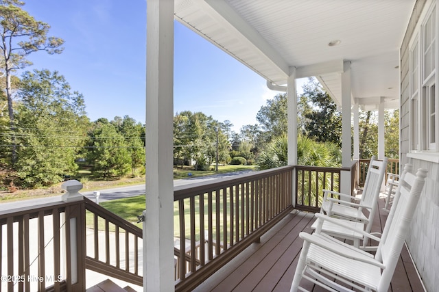 wooden deck featuring covered porch