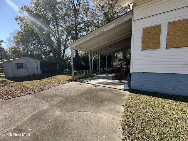 exterior space with a carport and a shed