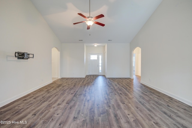 unfurnished living room with ceiling fan and wood-type flooring