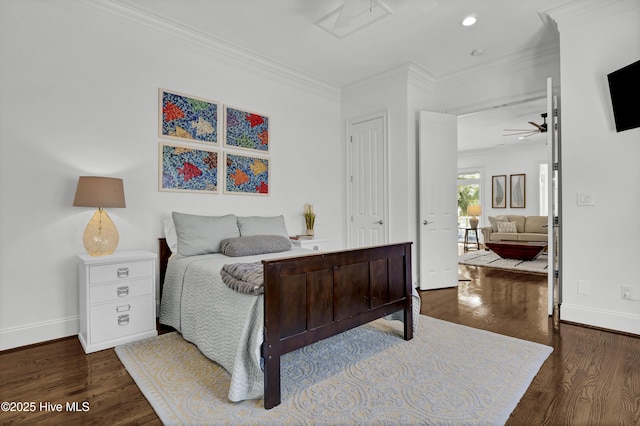 bedroom with a closet, dark hardwood / wood-style floors, and ornamental molding