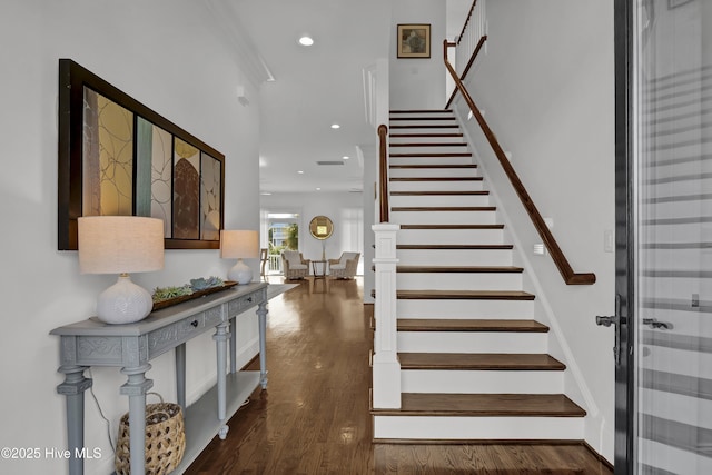 entryway with dark hardwood / wood-style floors