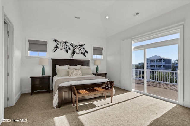 carpeted bedroom featuring access to outside and high vaulted ceiling