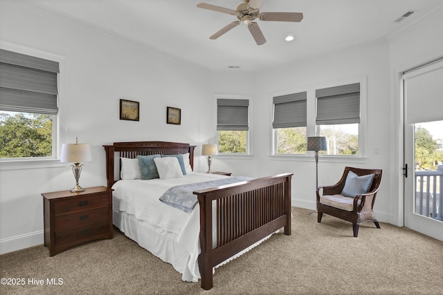 carpeted bedroom with ceiling fan, crown molding, and access to outside