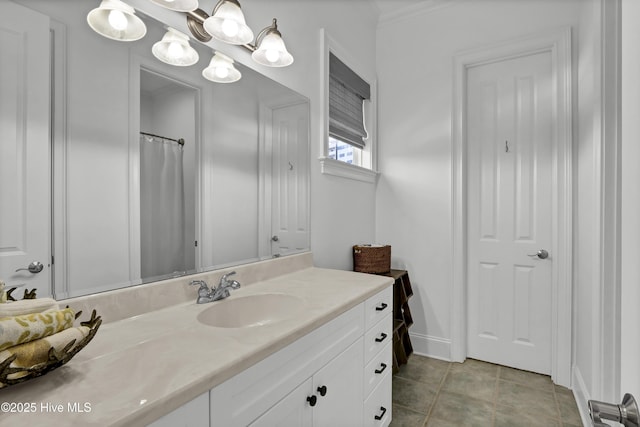 bathroom with vanity and an inviting chandelier