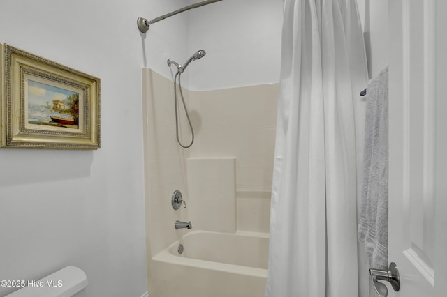 bathroom with toilet and shower / bathtub combination with curtain