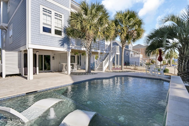 view of pool featuring a patio