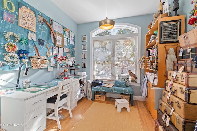 office area with light hardwood / wood-style flooring