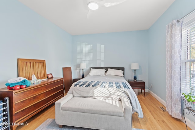 bedroom with light hardwood / wood-style floors