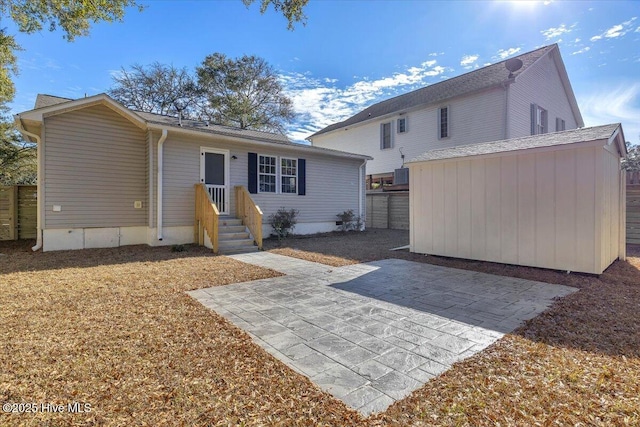 rear view of property with a patio area