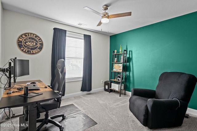 office area with carpet and ceiling fan