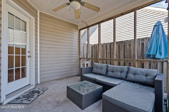 view of patio with an outdoor living space and ceiling fan