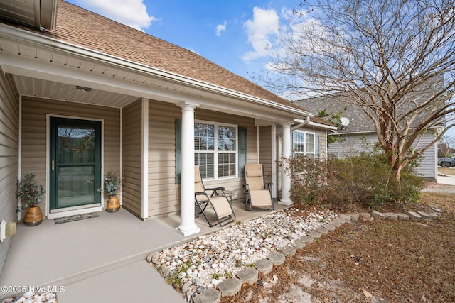 doorway to property featuring covered porch