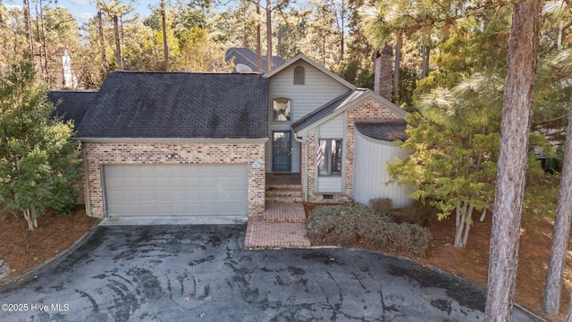 front facade with a garage