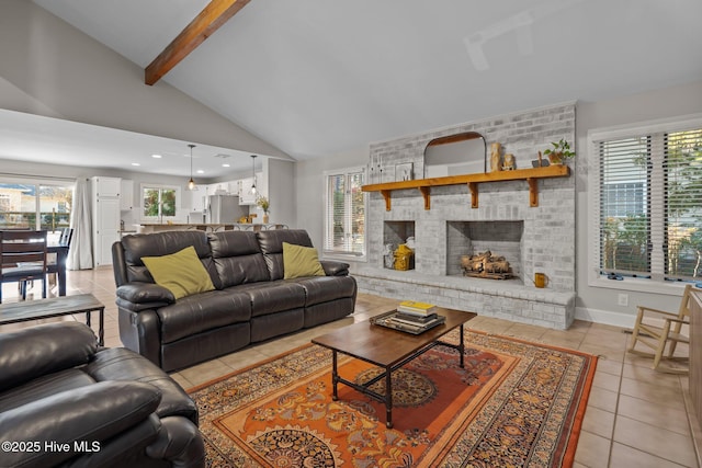 tiled living room featuring lofted ceiling with beams and a brick fireplace