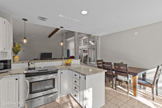 kitchen featuring kitchen peninsula, white cabinetry, light tile patterned floors, and appliances with stainless steel finishes