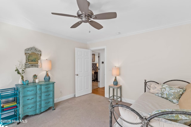 living area featuring light carpet, crown molding, and ceiling fan