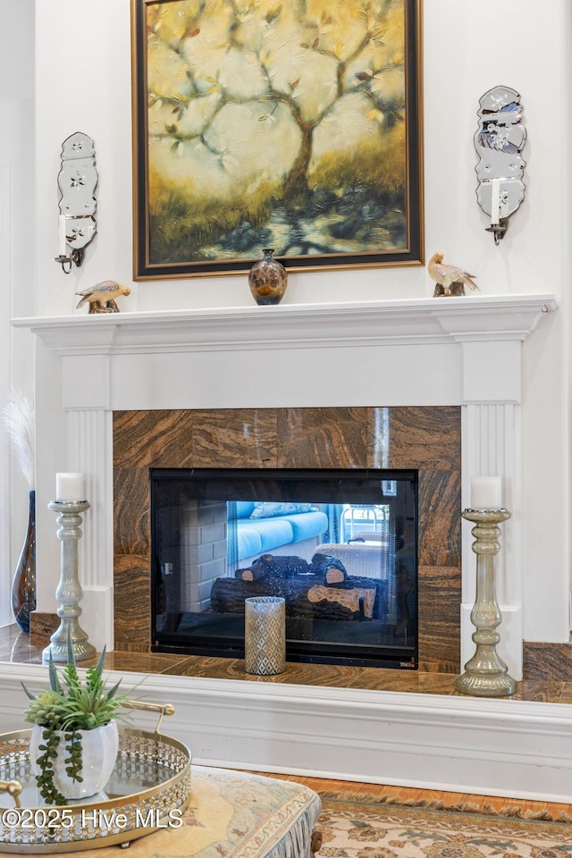 room details featuring a high end fireplace