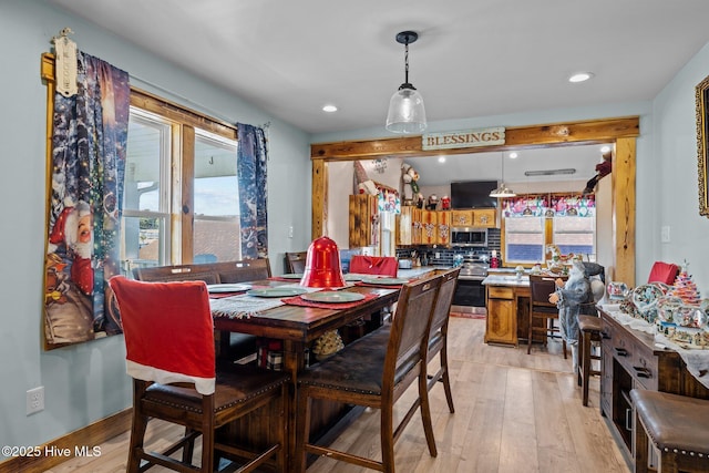 dining room featuring light hardwood / wood-style floors