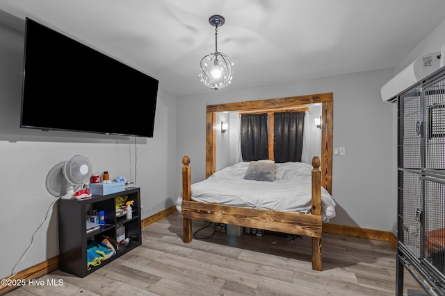 bedroom featuring light hardwood / wood-style flooring