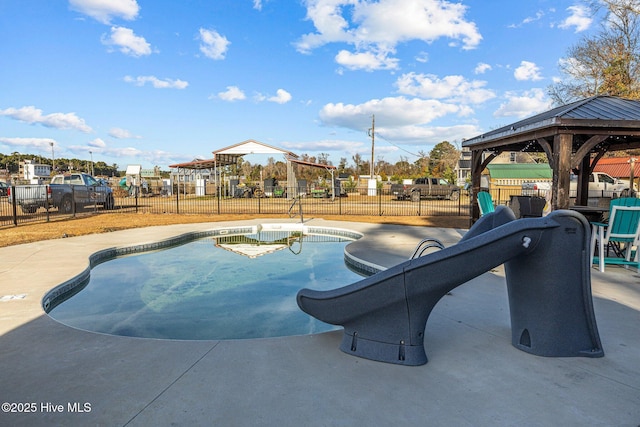 view of pool featuring a gazebo and a patio area