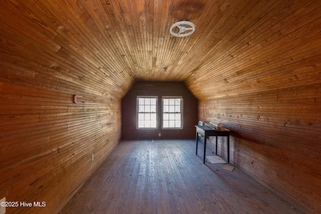 additional living space featuring lofted ceiling, wood-type flooring, and wooden ceiling