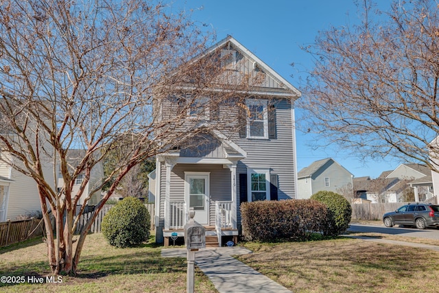 front facade featuring a front yard