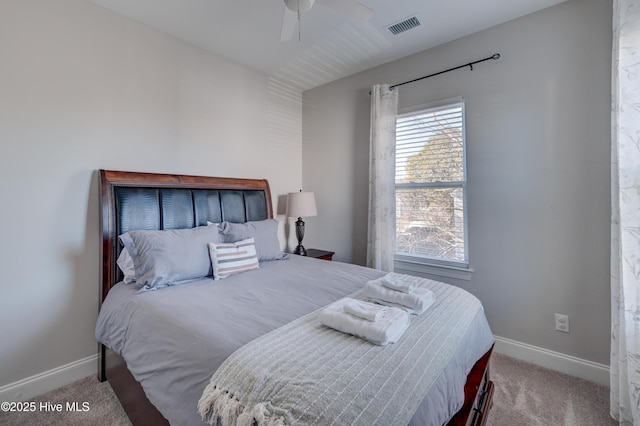 bedroom featuring ceiling fan and carpet