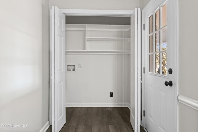 laundry area with dark wood-type flooring and washer hookup