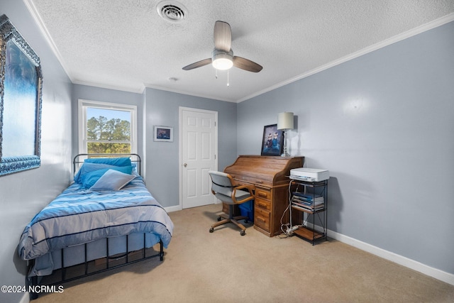 bedroom with light carpet, a textured ceiling, ceiling fan, and crown molding