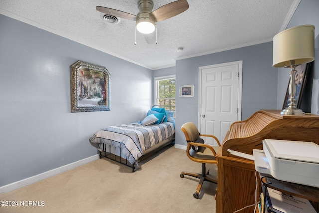 bedroom with light carpet, a textured ceiling, ceiling fan, and crown molding