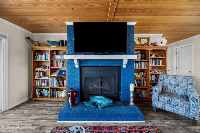 living room with wooden ceiling, a fireplace, and ornamental molding